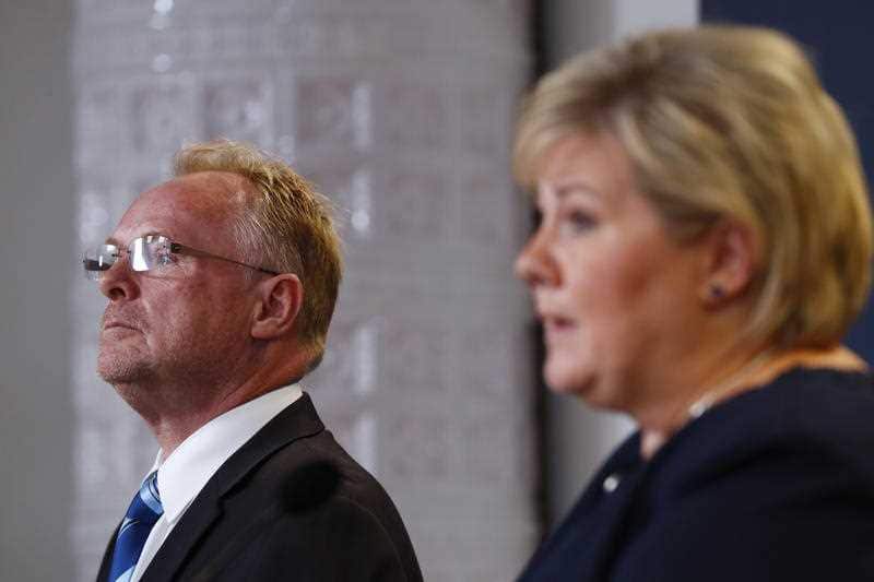 Norwegian prime minister Erna Solberg, right, and Norway's Minister of Fisheries Per Sandberg. Mr Sandberg has stepped down.