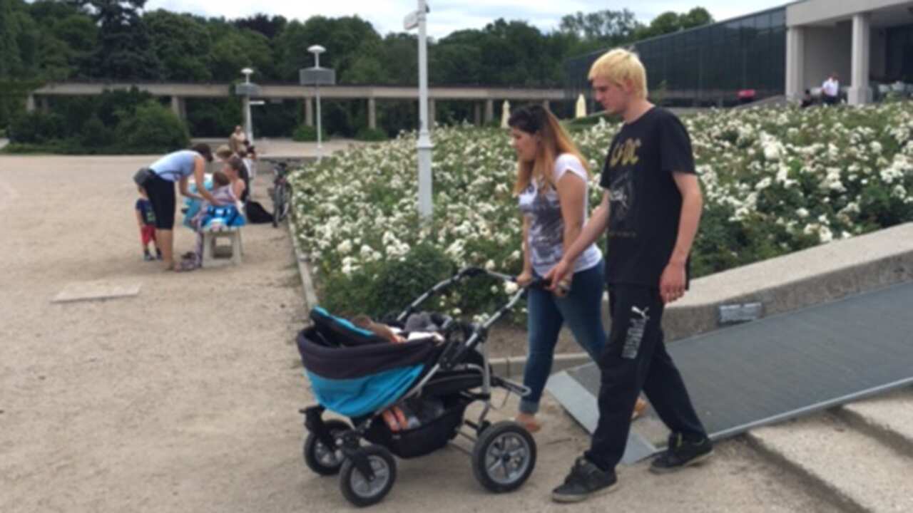 Natasha and Erik Myra Olsen with their twin girls in Poland.
