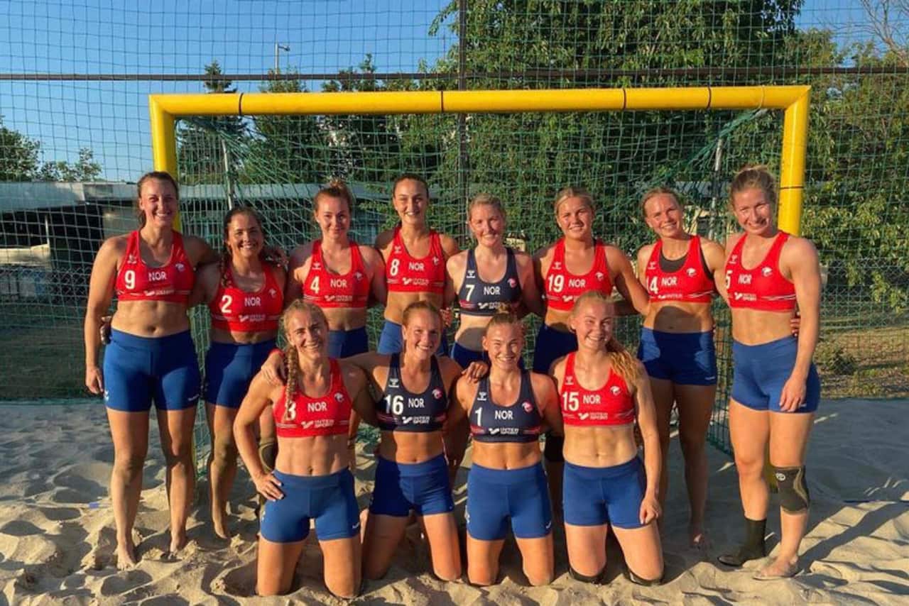 Norway's beach handball team pictured wearing shorts instead of bikini bottoms at a European championship match. 