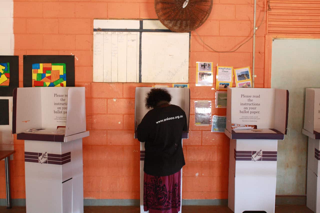 A voter at a remote polling booth on South Bathurst Island off the Northern Territory's north coast