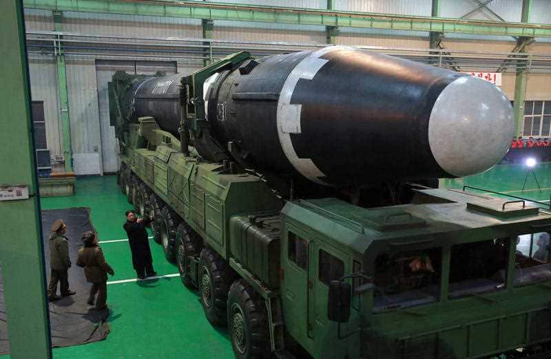 North Korean leader Kim Jong Un inspects what the North Korean government calls a Hwasong-15 intercontinental ballistic missile.