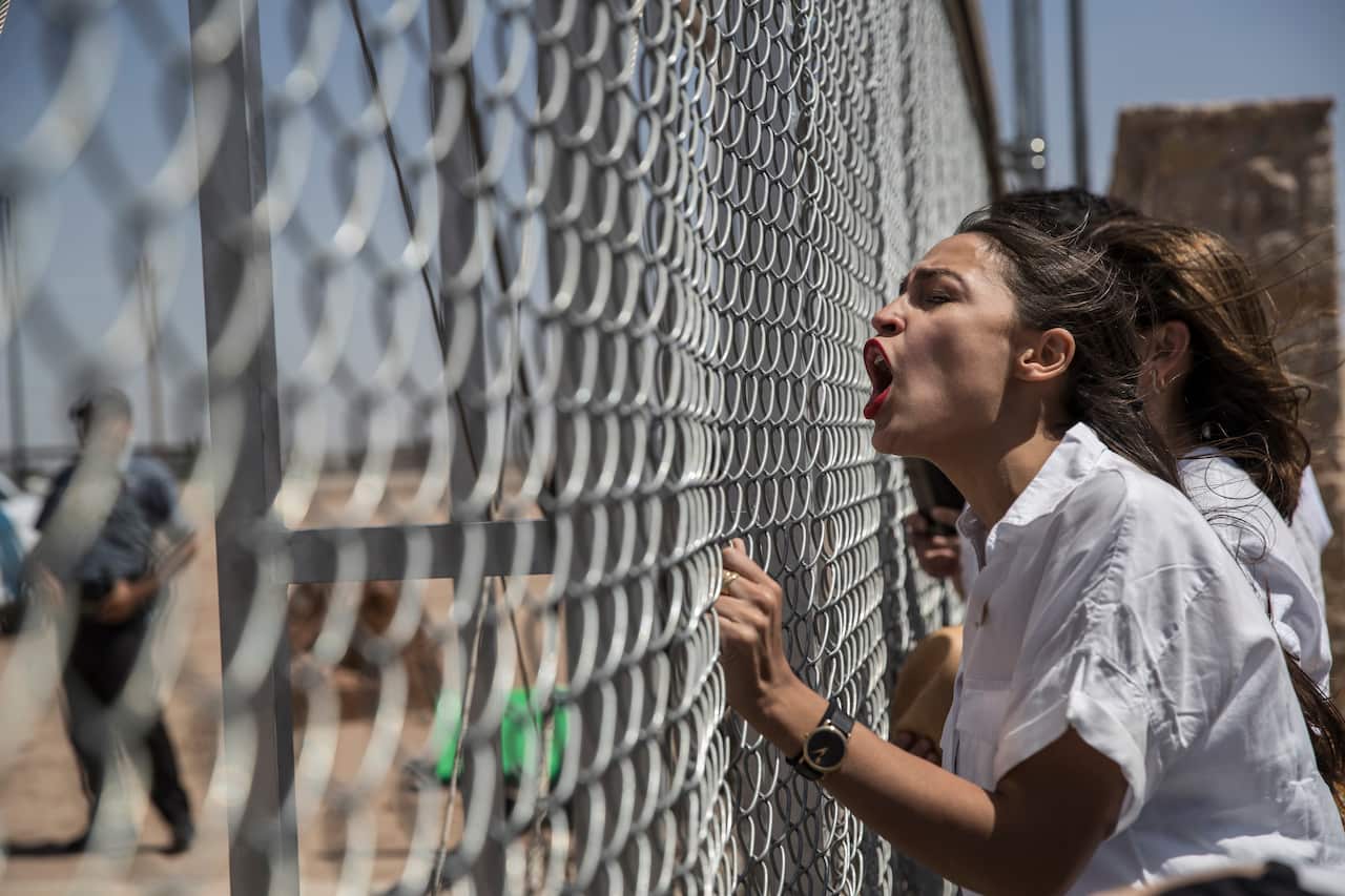 Alexandria Ocasio-Cortez, gathered with demonstrators to protest the Trump administrations immigration policy and the detention of children in Tornillo, Texas.