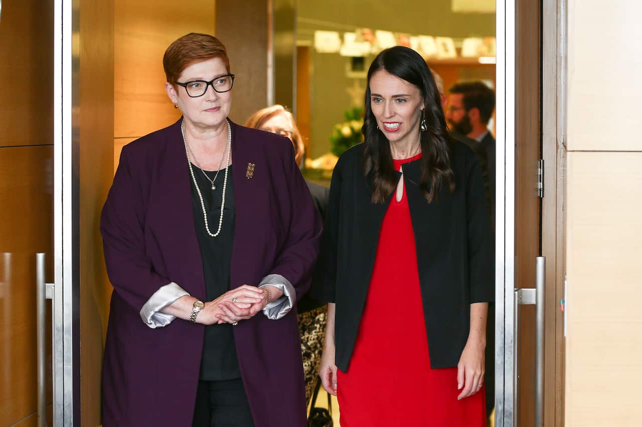 New Zealand Prime Minister Jacinda Ardern speaks to Australian Foreign Affairs Minister Marise Payne.