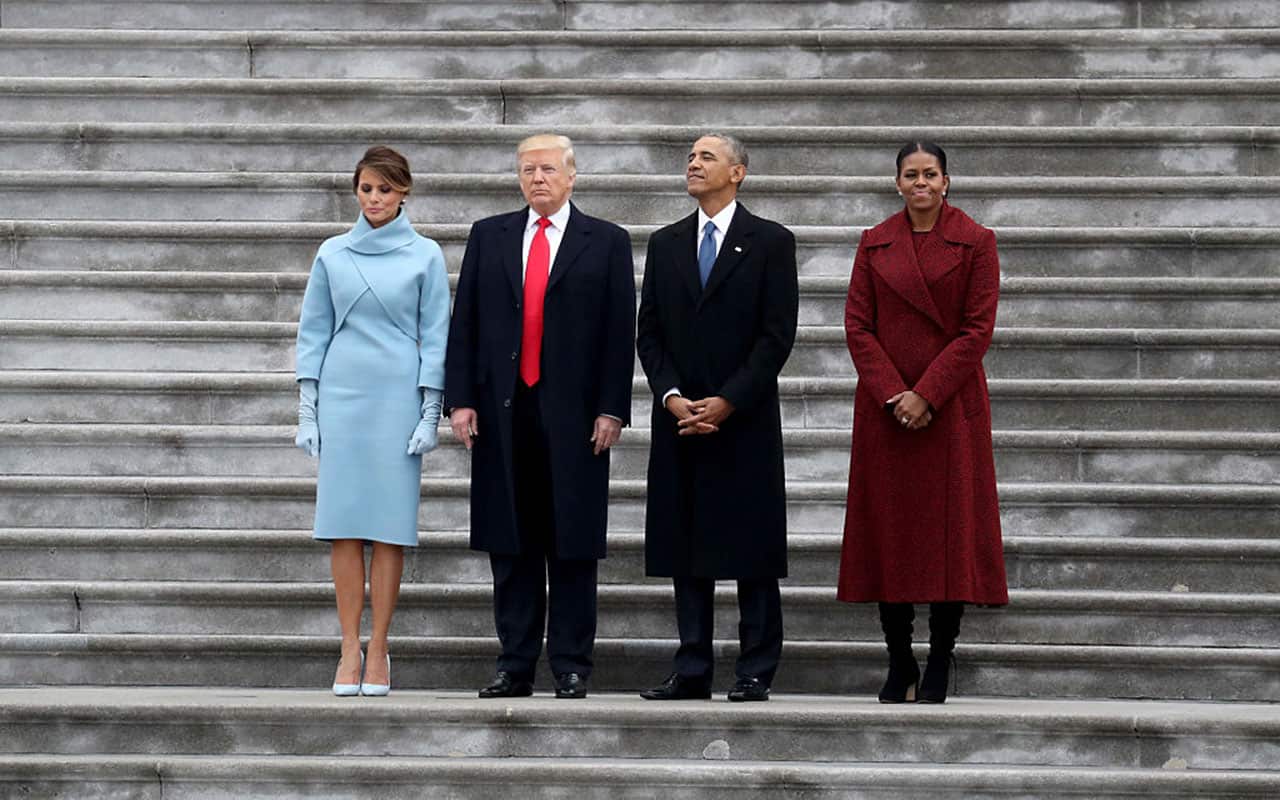President Donald Trump and former president Barack Obama stand on the steps of the US Capitol with First Lady Melania Trump and Michelle Obama.