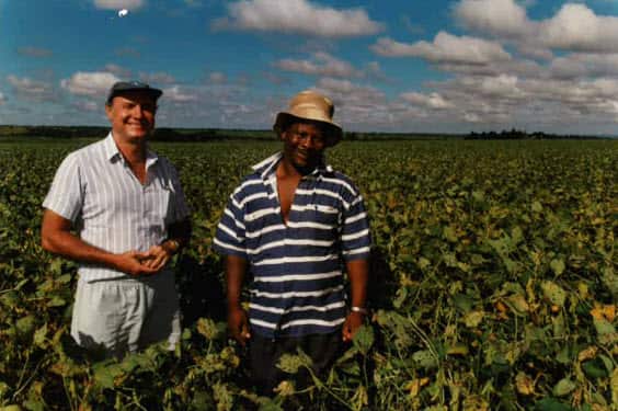 Cyril and his manager at the soya bean plantation in Zimbabwe
