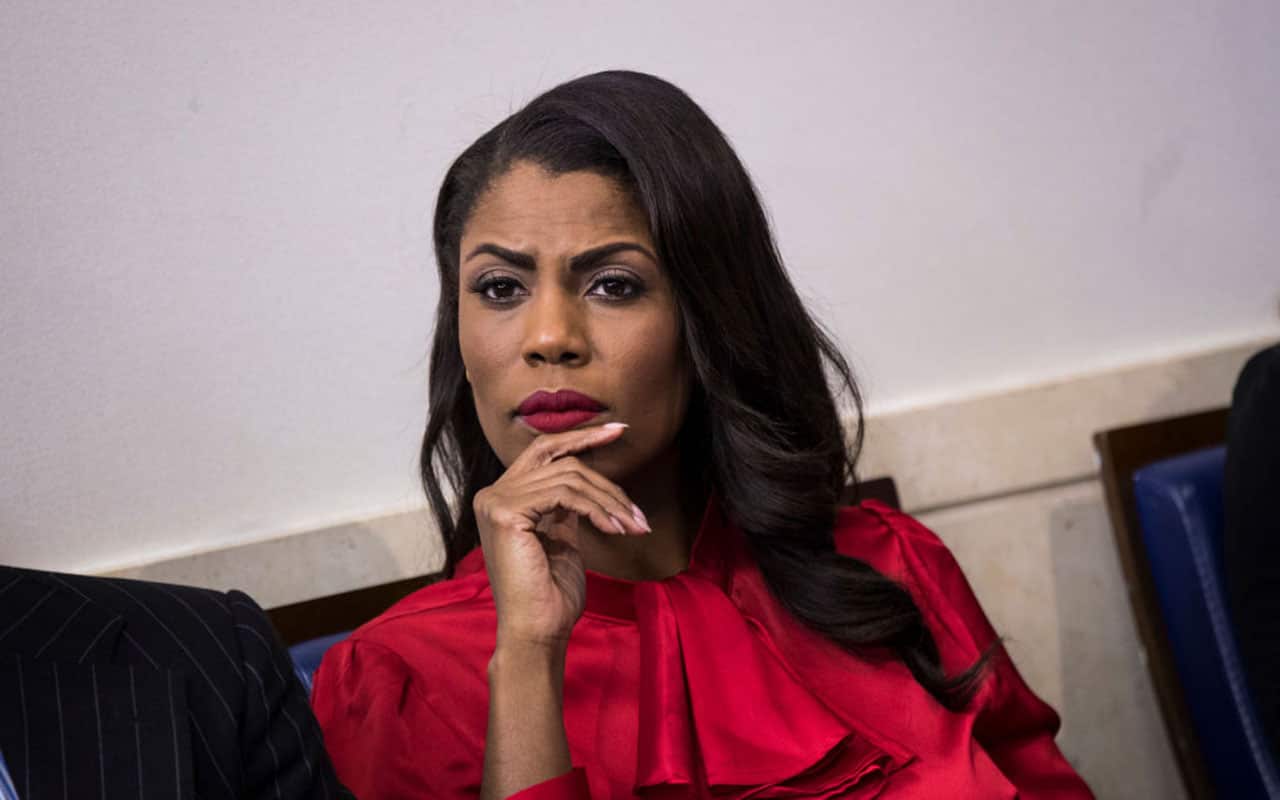 Omarosa Manigault listens during the daily press briefing at the White House.