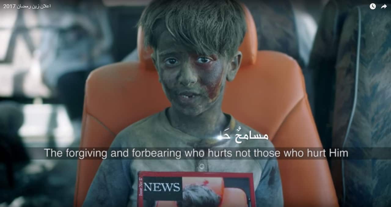 A still from the video, referencing the Syrian boy Omran Daqneesh.