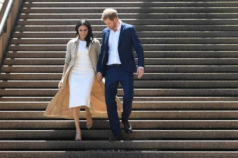 Britain's Prince Harry, the Duke of Sussex, and his wife Meghan, the Duchess of Sussex, arrive at the Sydney Opera House.
