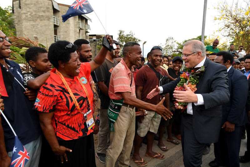 Mr Morrison meets locals at the opening of a lecture theatre building at the University of Papua New Guinea after the 2018 APEC Summit.