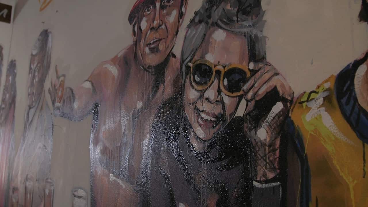 SBS's Lee Lin Chin on The Lady Hampshire's wall of Aussie Legends.