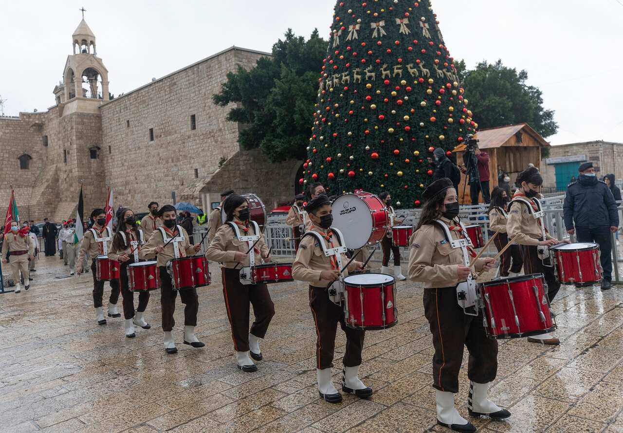 Few people were present to watch Palestinian scout bands perform in the West Bank city of Bethlehem.