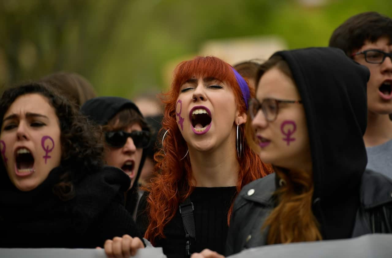 Women shout slogans during a protest against sexual abuse in Pamplona, northern Spain, Saturday, April 28
