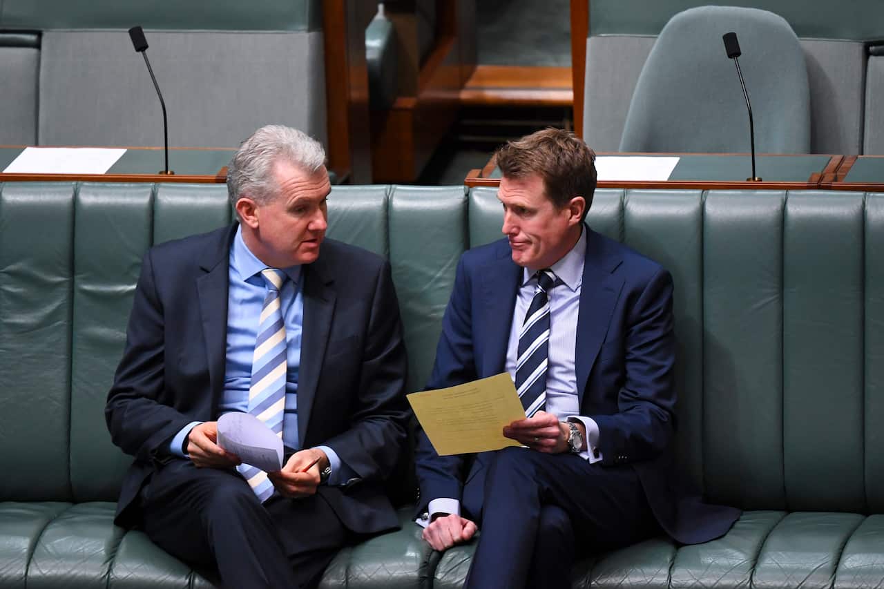 Australian Attorney-General Christian Porter speaks to the Manager of Opposition business Tony Burke.