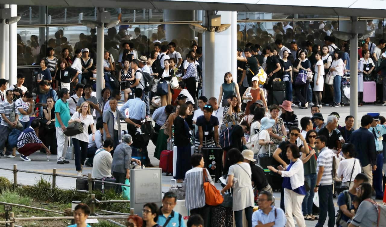 Passengers who spent the night at Kansai International Airport in Izumisano, Osaka Prefecture, western Japan, 05 September 2018