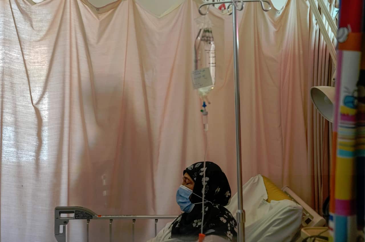A cancer patient waits to receive chemotherapy at a Beirut hospital.