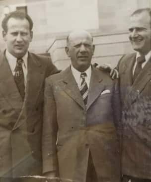 Paul with his father and brother. 