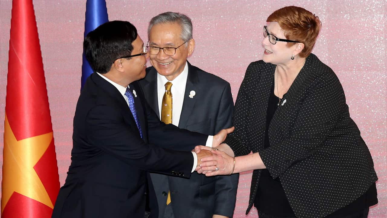 Australia's Foreign Minister Marise Payne greets Vietnam's Foreign Minister Pham Binh Minh and Thailand's Minister of Foreign Affairs Don Pramudwinai.