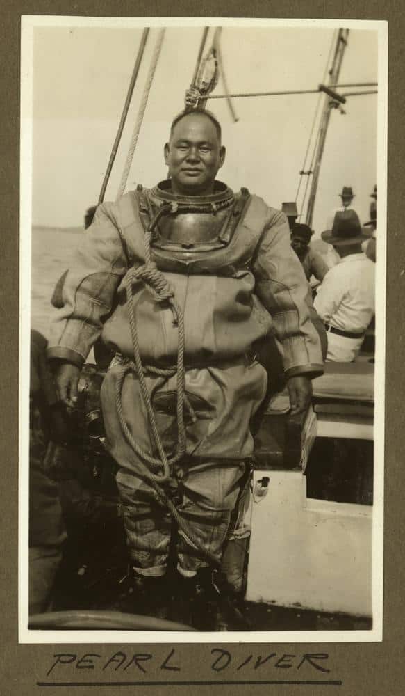 Unnamed Japanese pearl diver suited up aboard a lugger.