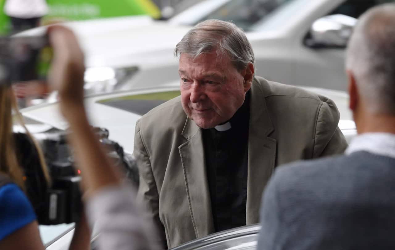 Cardinal George Pell arrives at the Melbourne Magistrates Court.