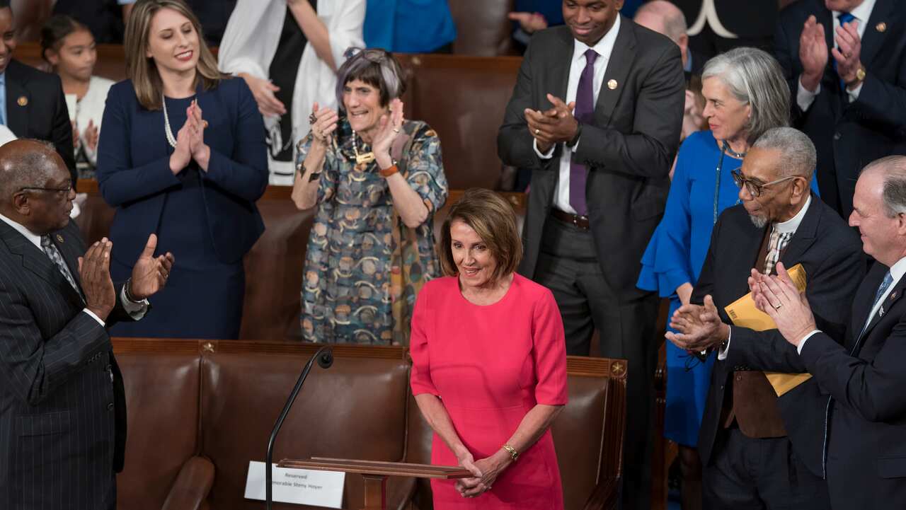 House Democratic Leader Nancy Pelosi of California celebrates her election as speaker of the House.