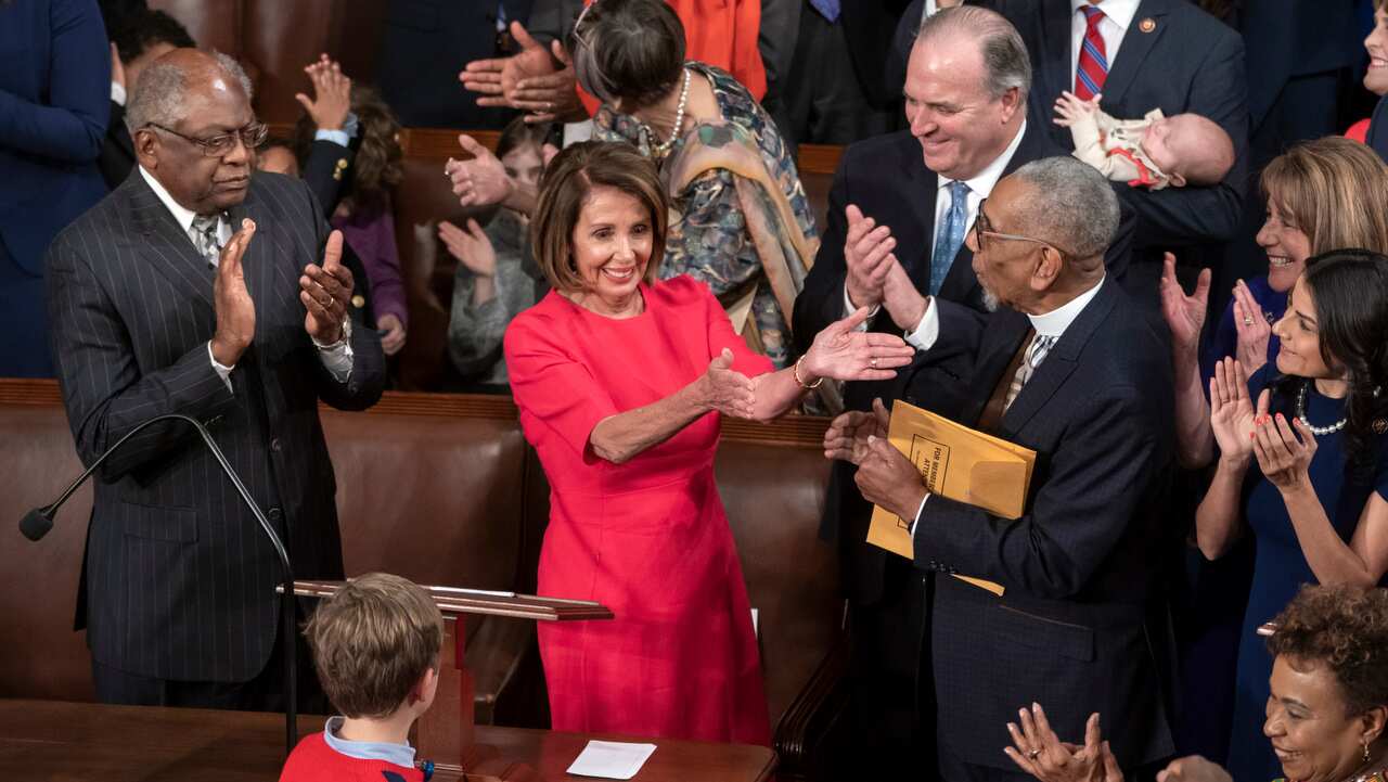 House Democratic Leader Nancy Pelosi of California celebrates her election as speaker of the House.