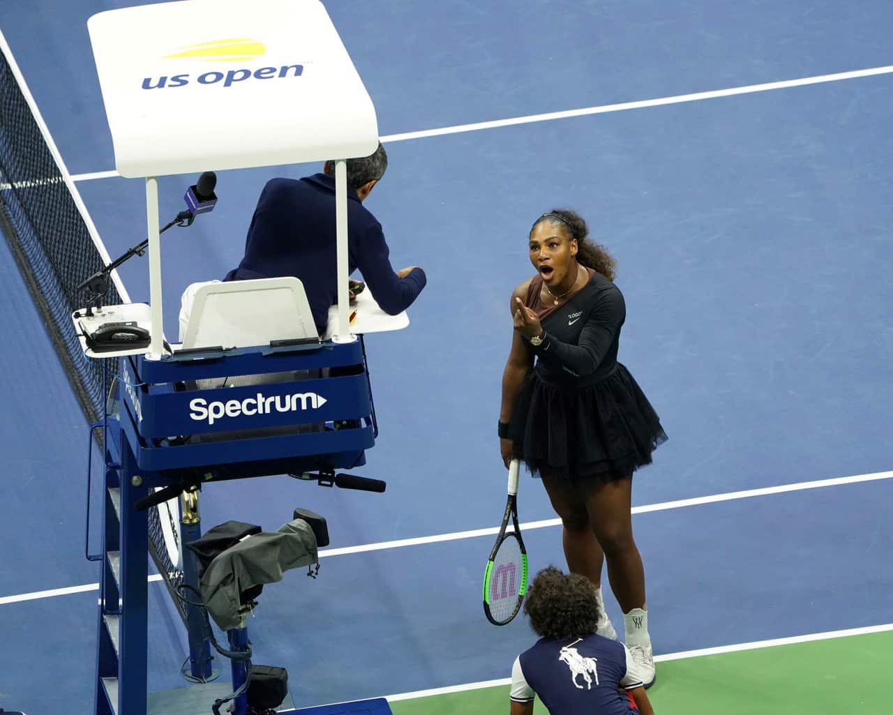 Serena Williams argues with chair umpire Carlos Ramos over his decision to deduct a game.