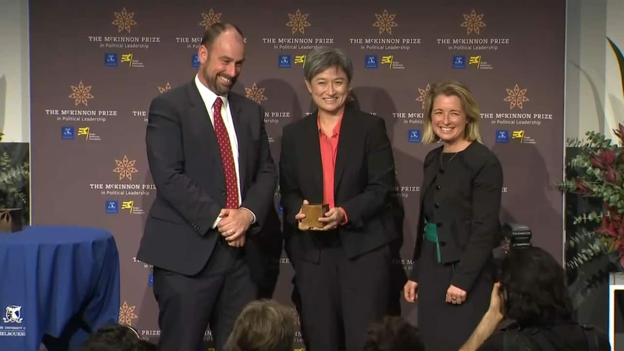 Penny Wong accepts the award.