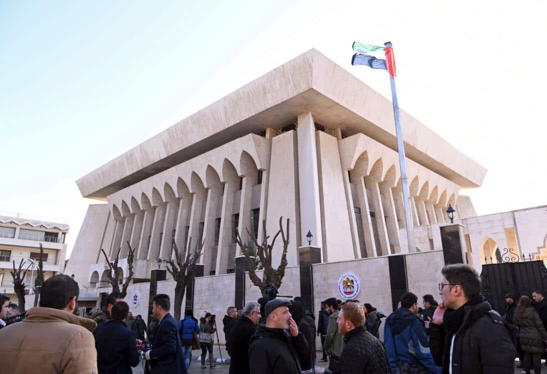 People gather outside the embassy of the United Arab Emirates, in Damascus, Syria (AAP)