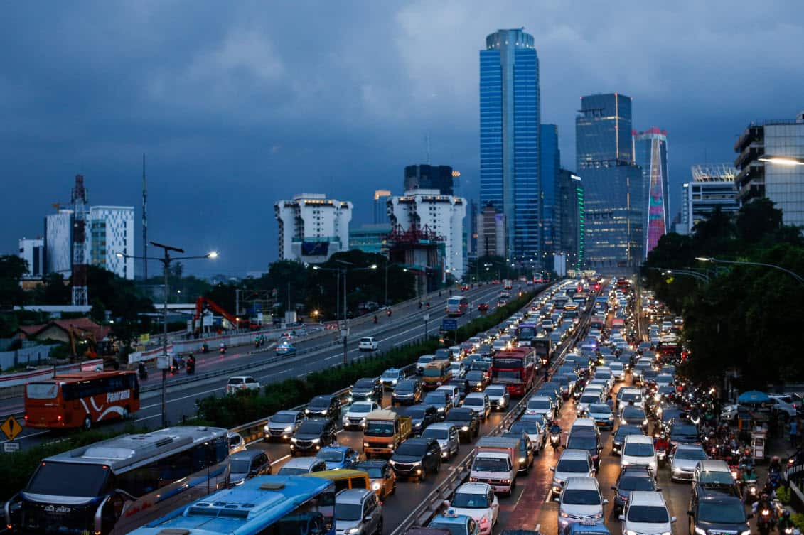 People wait in traffic on a busy road in Jakarta, Indonesia, 28 February 2019 (issued 01 March 2019) (AAP)