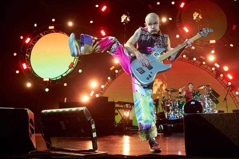 Red Hot Chili Peppers bassist Flea performs.