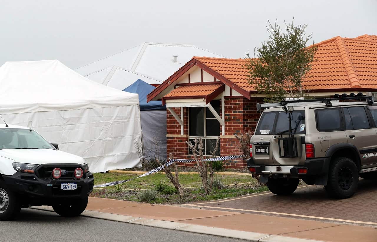 Forensic Services attend the scene where three people were found dead in Ellenbrook, Perth.