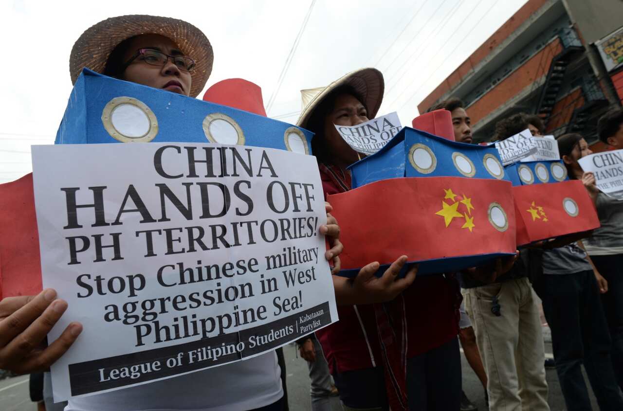 Filipino students protest on March 2, 2016, after Chinese vessels dropped anchor near a South China Sea atoll also claimed by the Philippines