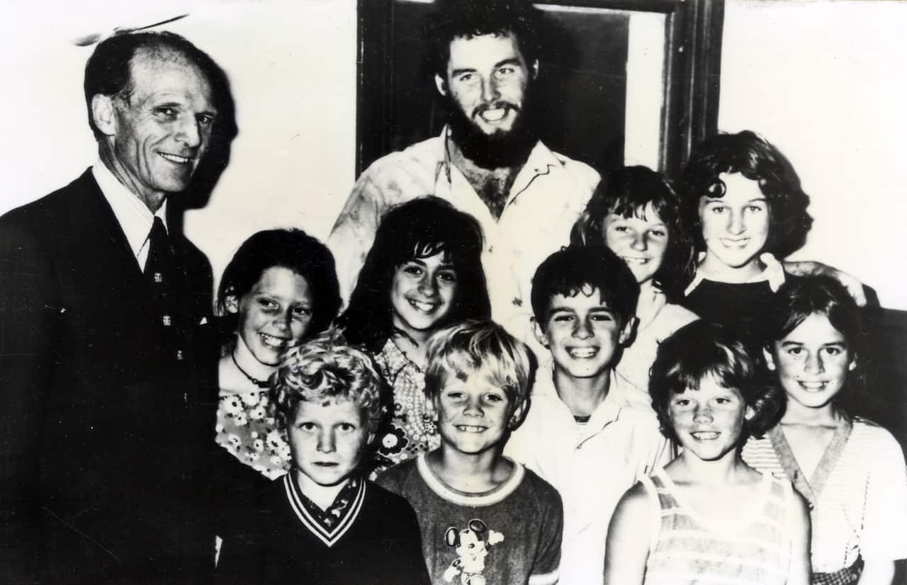 The nine children of Wooreen Primary School and their teacher Rob Harvey (middle).