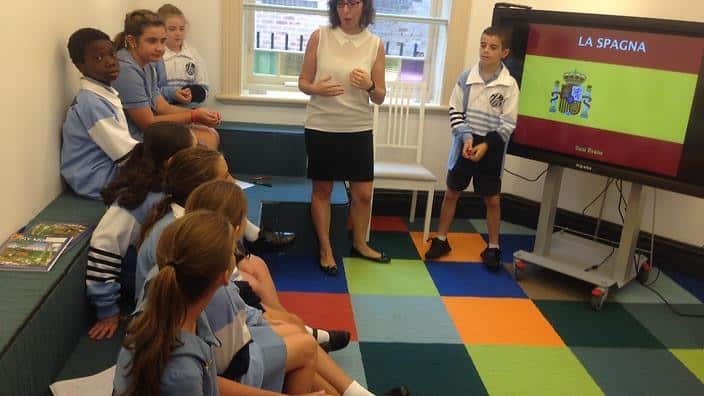 Students ask questions after Sam's presentation on Spain.