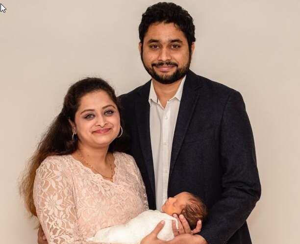 Pavan Kumar with his wife Lakshmi and their son.