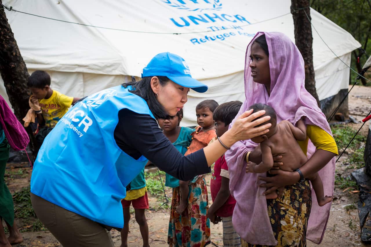 Joung-ah Ghedini-Williams, left, at the UN Refugee Agency Transit Centre in Bangladesh