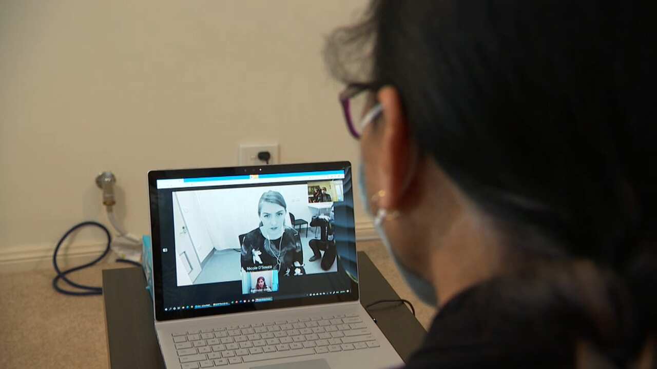 Ms Chandra talks to her physio Natalia Ghosn and interpreter Balvinder Sidhu.