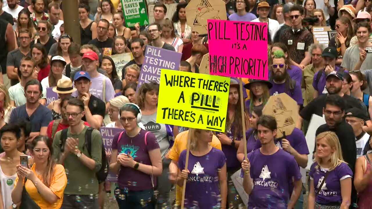 Protesters in Sydney call for the NSW government to support a pill testing trial.