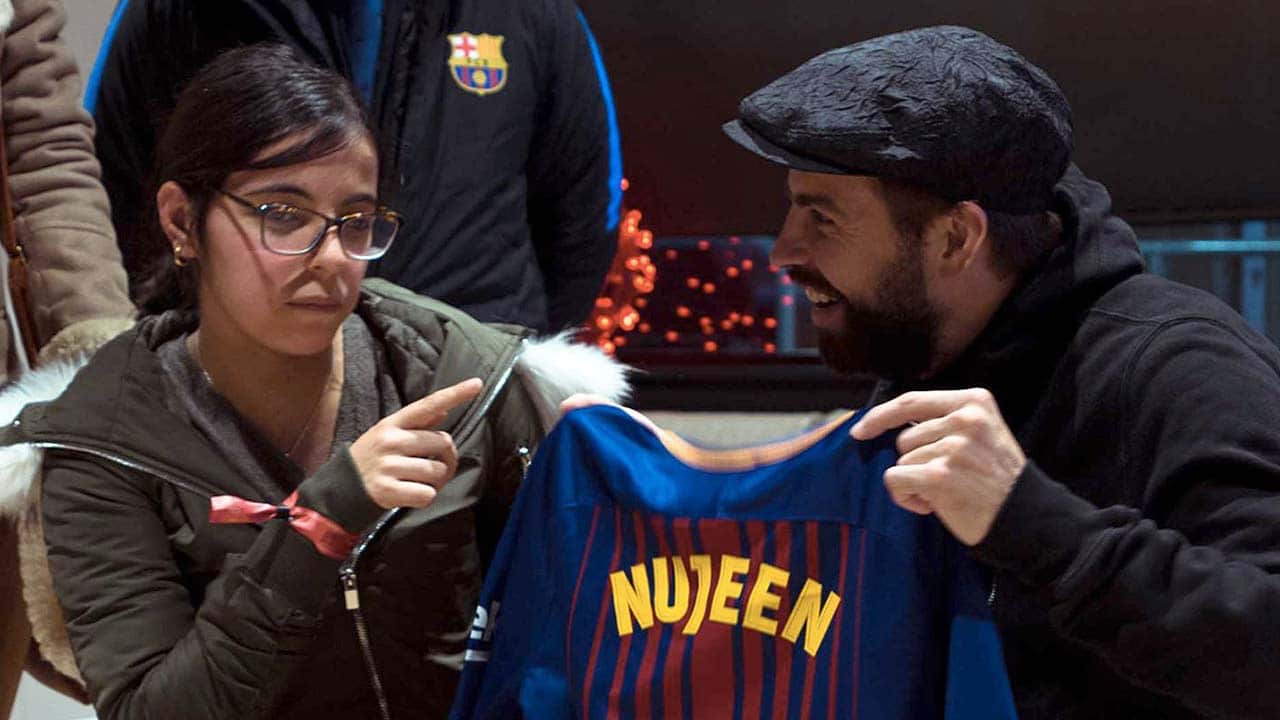 Barcelona player Gerard Pique meets Nujeen Mustafa