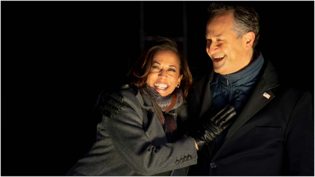 Kamala Harris and her husband Douglas Emhoff celebrate victory. 