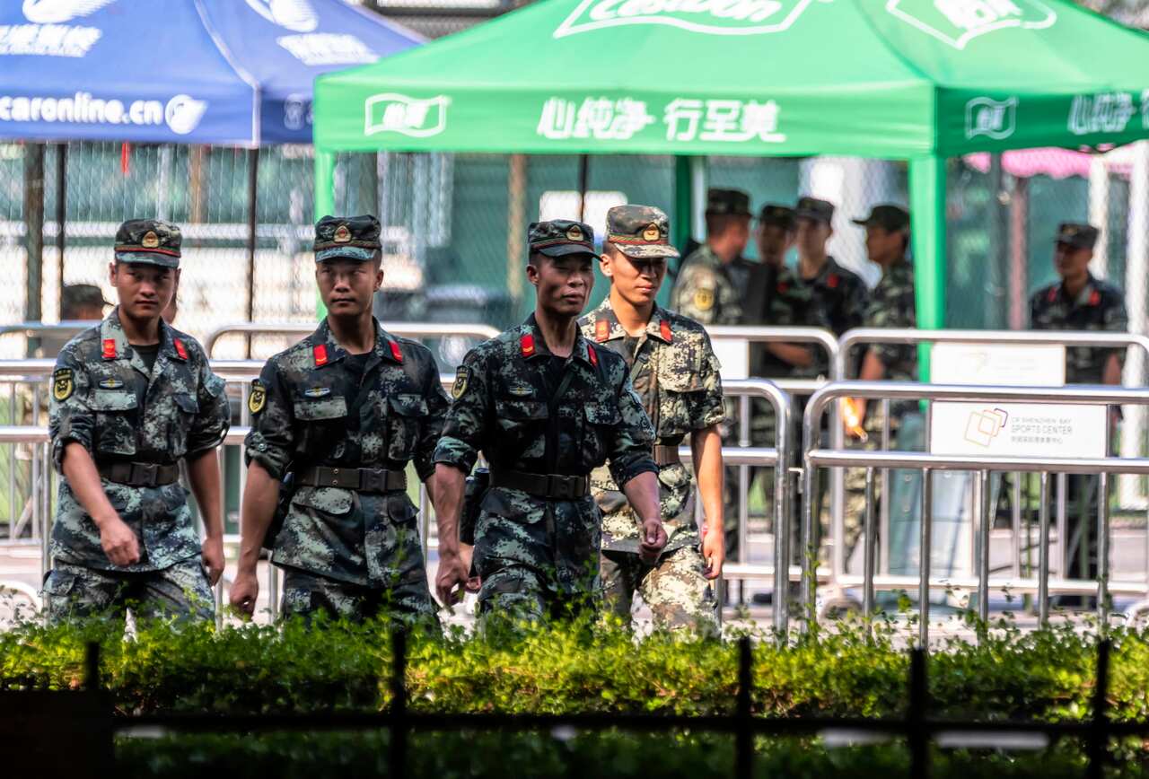 China has deployed large numbers of paramilitary personnel only 25km away from the Hong Kong border, just across the harbour.