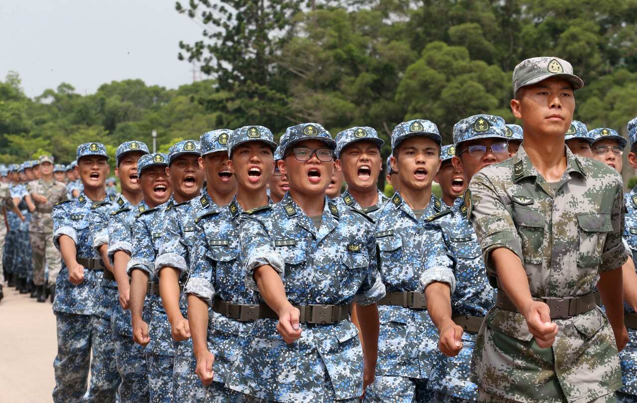 People's Liberation Army  from the 9th Hong Kong Tertiary Military Camp at the San Wai Barracks of the Hong Kong Garrison in Fanling. China has issued a warning to the Hong Kong protesters.
