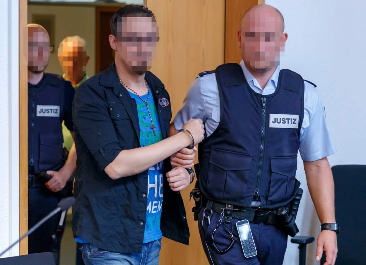 Defendant Christian L. (front L) arrive for his pronouncement of judgement.