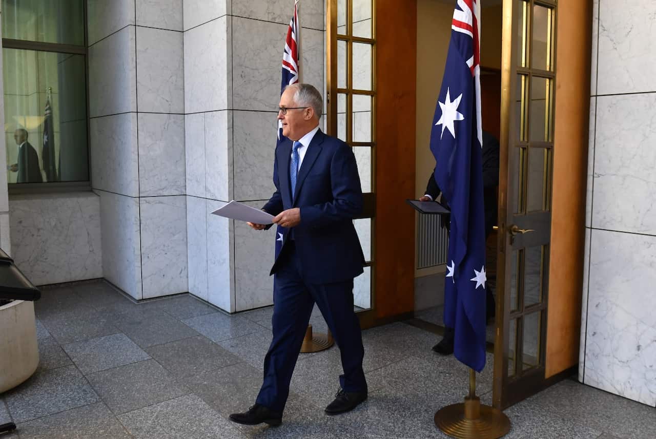 Prime Minister Malcolm Turnbull arrives at a press conference at Parliament House in Canberra, Thursday, November 30, 2017.
