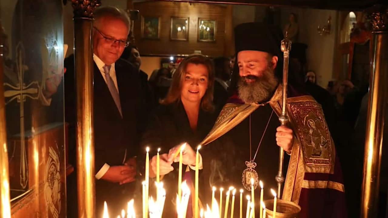 Scott Morrison and his wife, Jenny Morrison, at the Greek Orthodox Church of the Resurrection of the Christ.