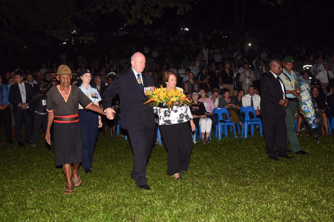 Governor General Peter Cosgrove lays at wreath at the Anzac Day dawn service at Bomana War Cemetery near Port Moresby, Papua New Guinea (AAP)