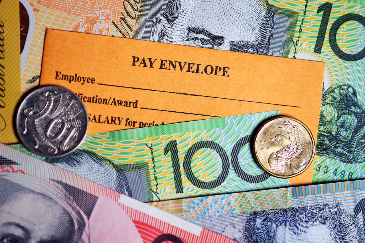 A stock photograph of Australian currency and a wages envelope.