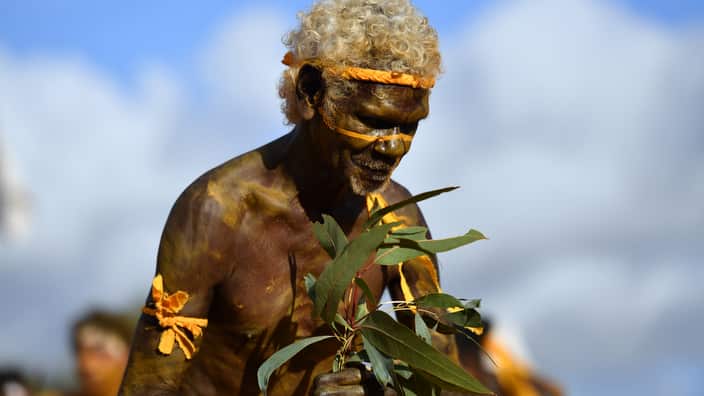 Clan members of the Yolngu people perform the Bunggul traditional dance during the Garma Festival 