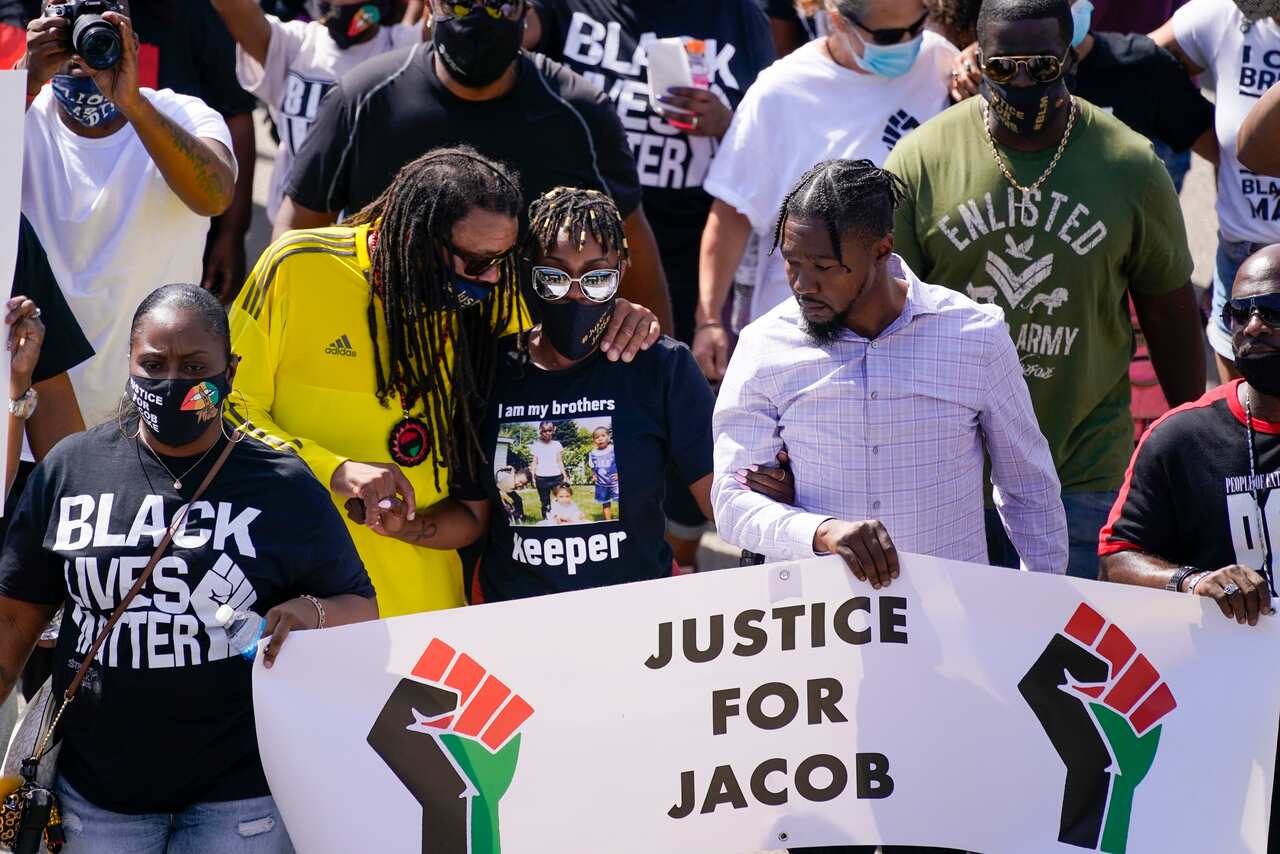 Jacob Blake’s family leads an anti-violence march.