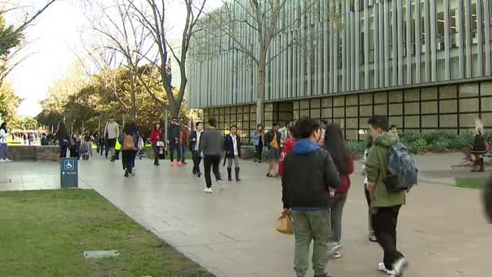 Students walk outside